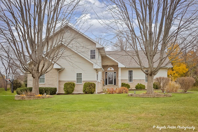 view of property with a front lawn