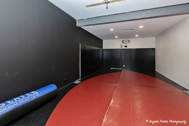 interior space featuring beamed ceiling