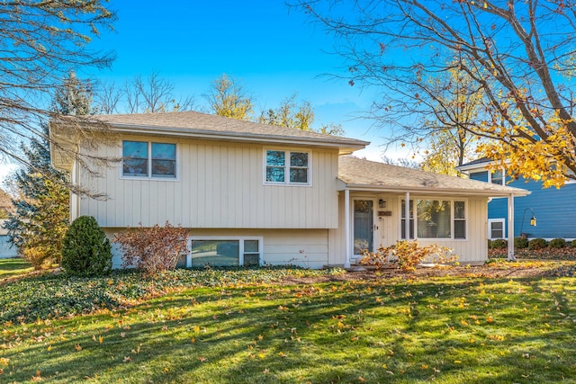 tri-level home featuring a front yard