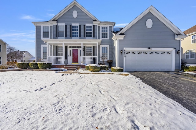 front facade featuring a garage and a porch