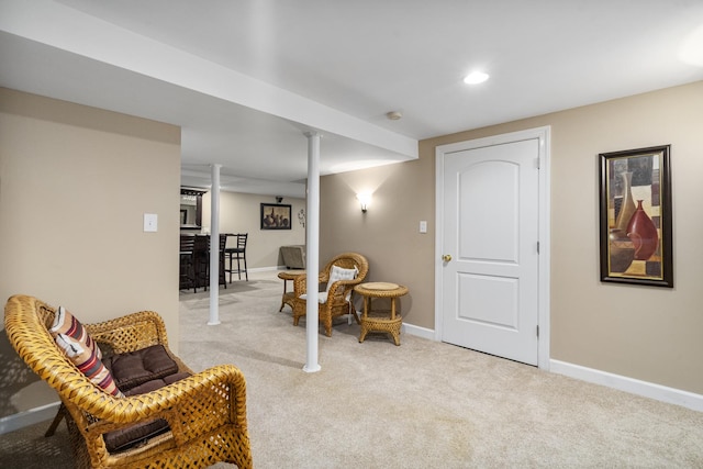 sitting room with light colored carpet