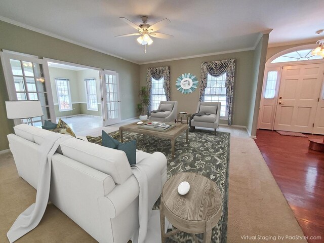 living room featuring wood-type flooring, french doors, ceiling fan, and ornamental molding