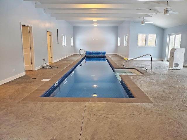 indoor pool with a ceiling fan