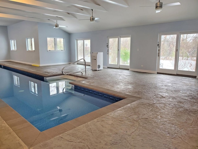 indoor pool with a ceiling fan