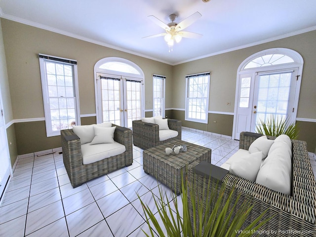 living area featuring french doors, a healthy amount of sunlight, and light tile patterned floors