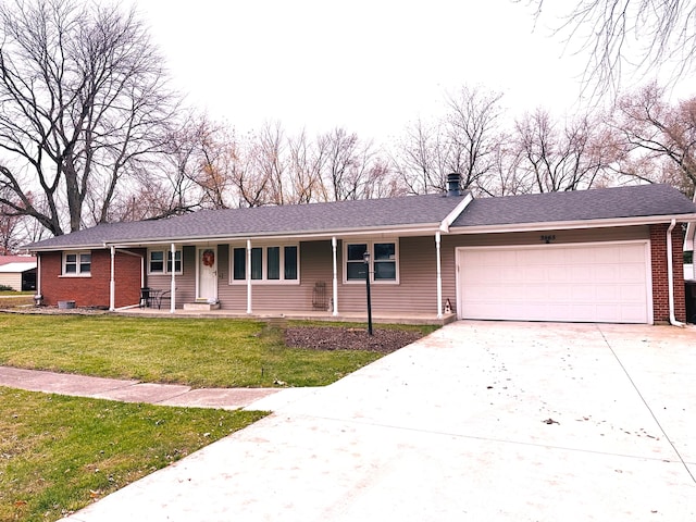 ranch-style house featuring a porch, a garage, and a front lawn