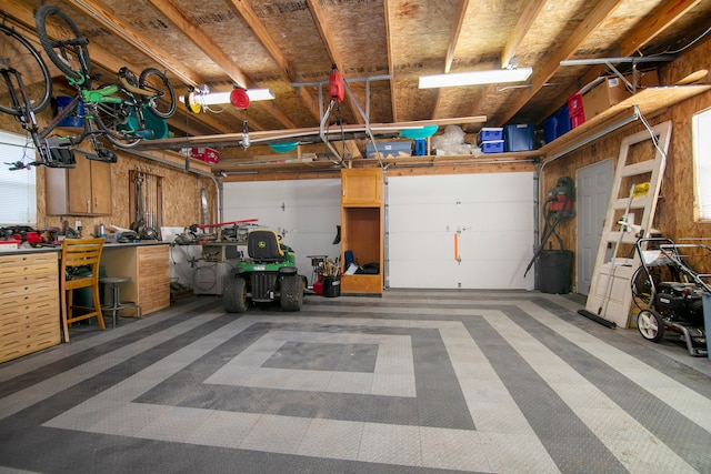 garage featuring a workshop area