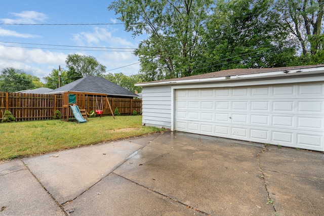 garage featuring a yard