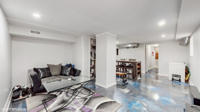 living room featuring concrete floors