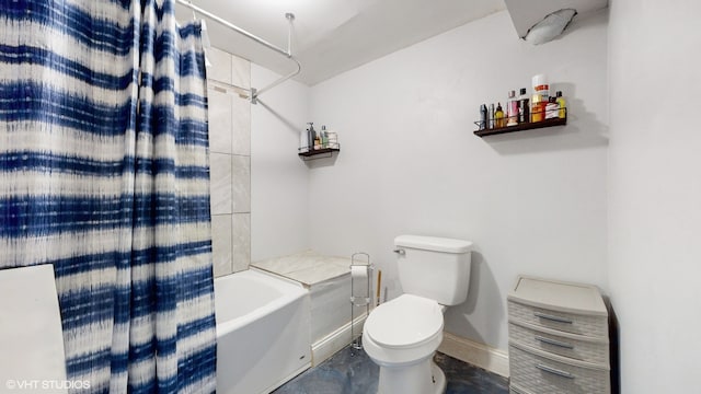 bathroom with shower / bath combo and toilet