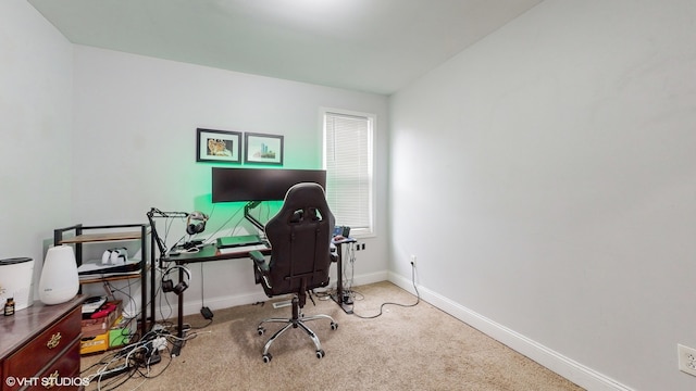 office area featuring light colored carpet