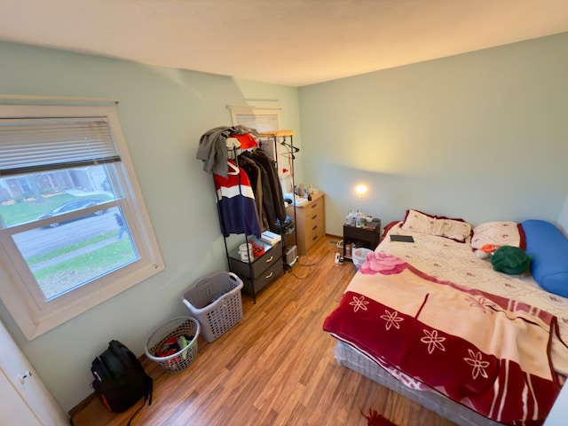 bedroom featuring wood-type flooring