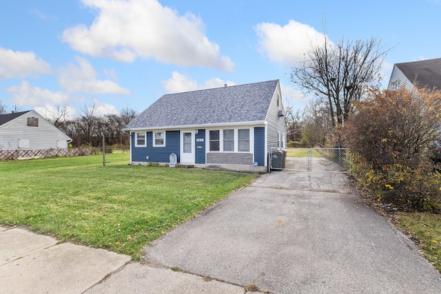 bungalow-style home with a front lawn