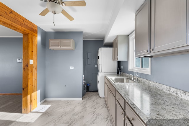 kitchen featuring white fridge, ceiling fan, crown molding, and sink