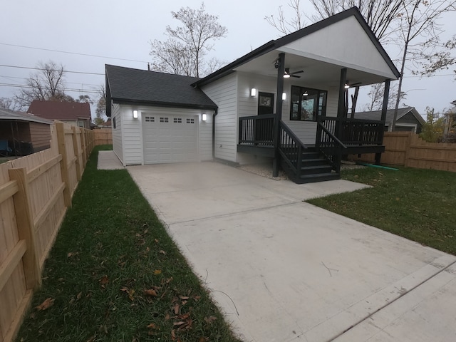 view of front of house with a porch and a front yard