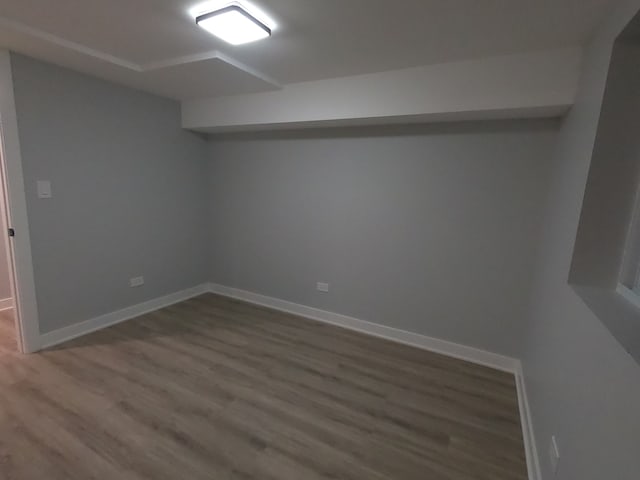 basement with wood-type flooring