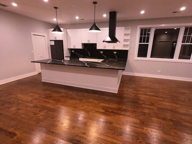 kitchen with decorative light fixtures, white cabinetry, dark hardwood / wood-style floors, and exhaust hood