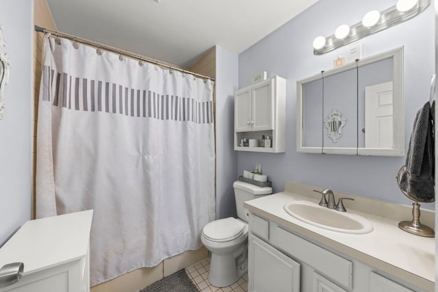 bathroom with toilet, vanity, tile patterned floors, and walk in shower