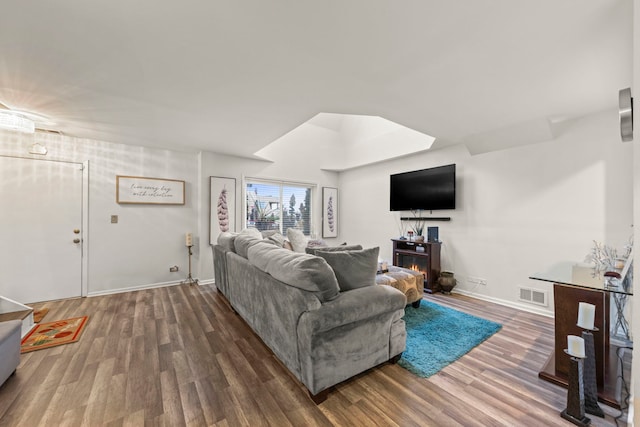 living room with dark wood-type flooring