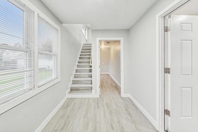 staircase featuring hardwood / wood-style floors