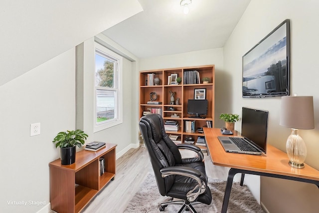 office area with light hardwood / wood-style flooring