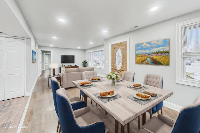 dining area featuring light hardwood / wood-style flooring