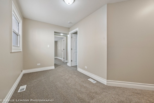 view of carpeted spare room