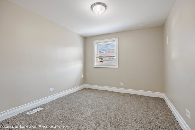 spare room with carpet flooring