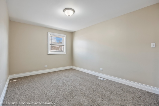 empty room featuring carpet