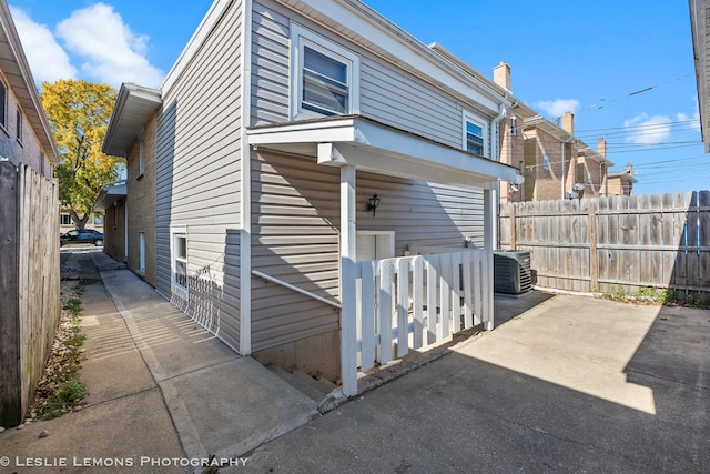 view of front of house with central AC unit