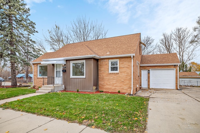 view of front facade with a garage and a front yard