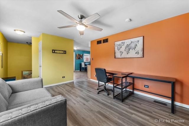 office area featuring hardwood / wood-style floors and ceiling fan