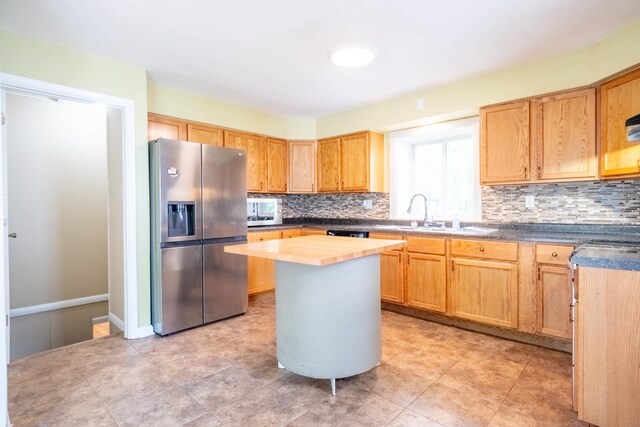 615 W Union St, Champaign, IL 61820 - kitchen with wood counters, black dishwasher, stainless steel electric stove, and a sink