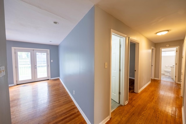 615 W Union St, Champaign, IL 61820 - hallway featuring baseboards and wood finished floors