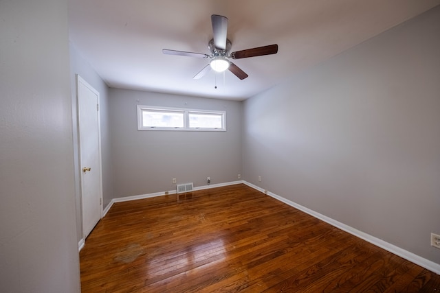 empty room featuring ceiling fan and wood-type flooring