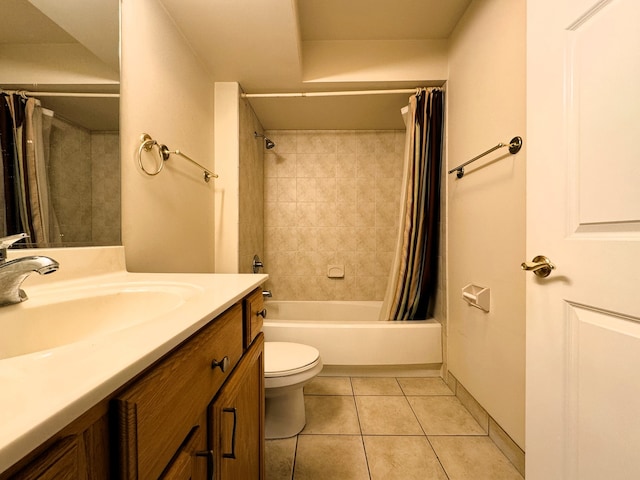 full bathroom with tile patterned flooring, vanity, toilet, and shower / bath combo with shower curtain