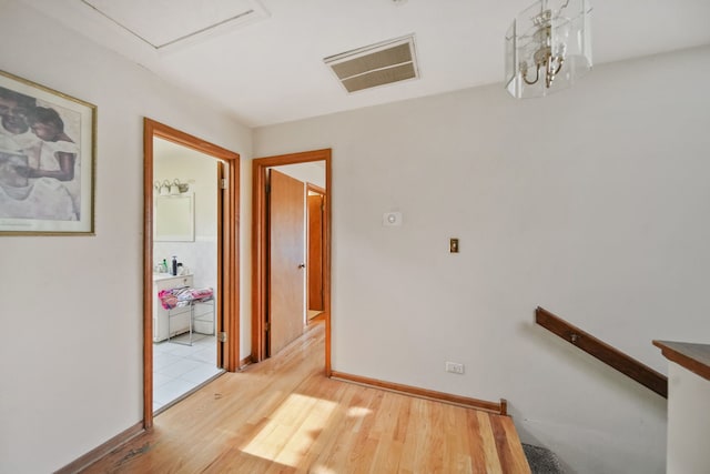 hall featuring light hardwood / wood-style flooring