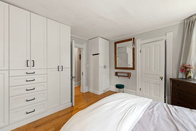 bedroom featuring light wood-type flooring