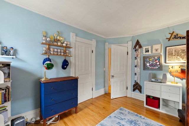 bedroom featuring light hardwood / wood-style floors