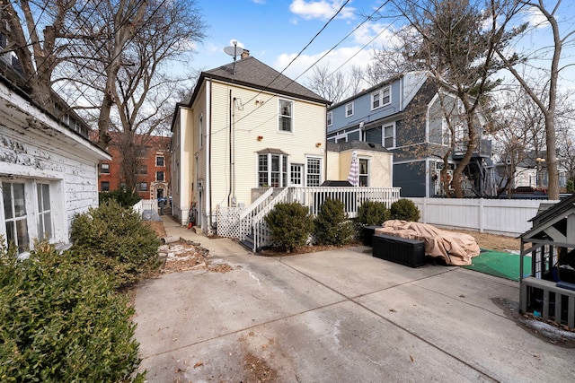 back of house featuring a patio area