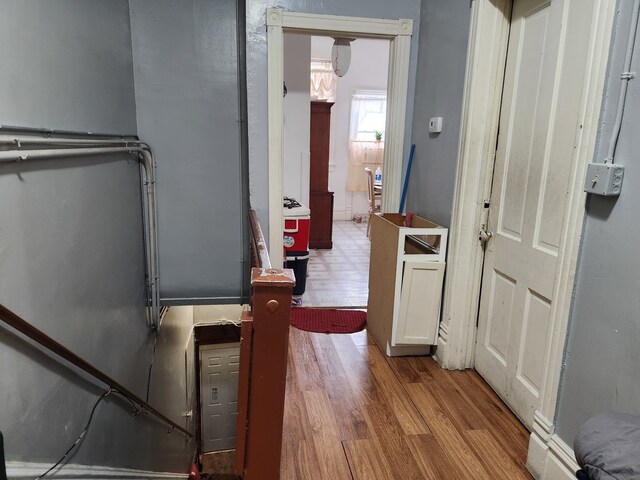 corridor featuring hardwood / wood-style flooring