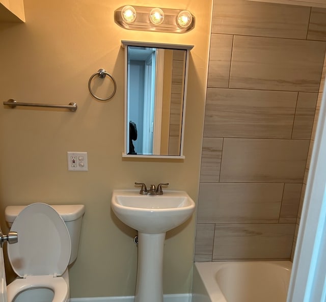 bathroom featuring plus walk in shower and toilet