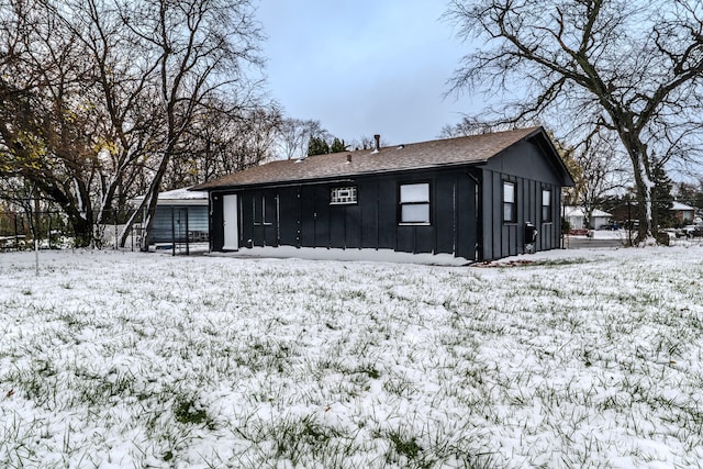 view of snow covered house