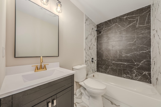 full bathroom with toilet, vanity, and tiled shower / bath