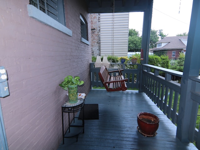 wooden deck featuring a porch