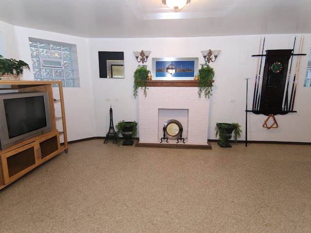 living room featuring a fireplace