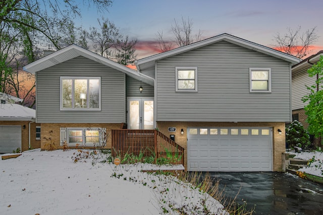 view of front of home with a garage