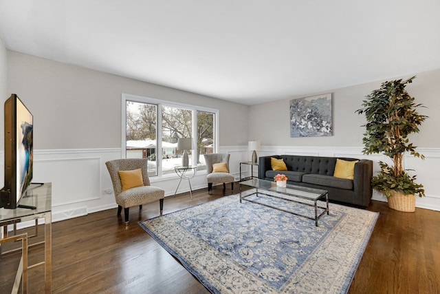 living room with dark wood-type flooring