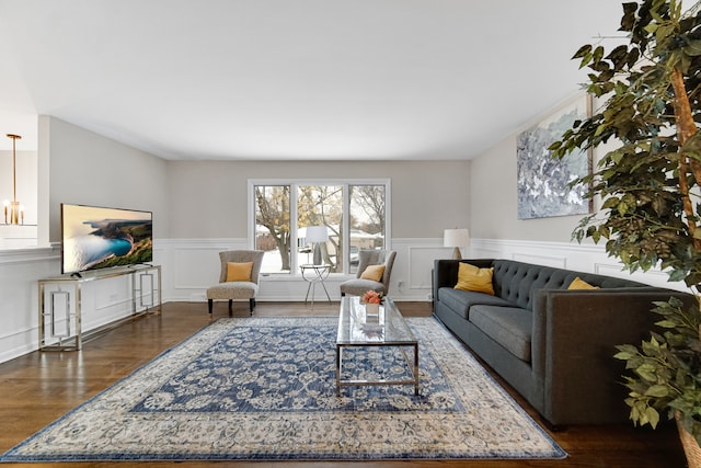 living room featuring dark hardwood / wood-style flooring