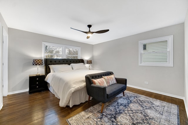 bedroom featuring dark hardwood / wood-style flooring and ceiling fan